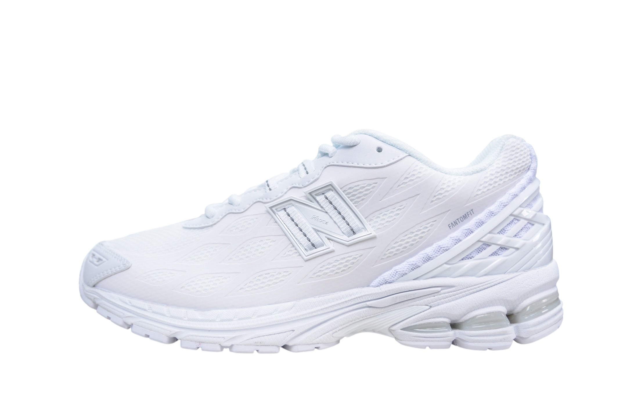 A white New Balance running shoe shown from the side profile against a solid white background.